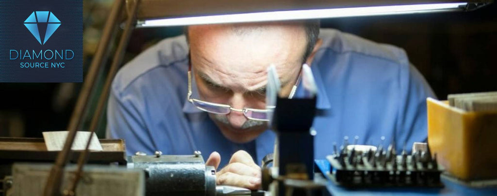 Professional diamond appraiser examining a diamond