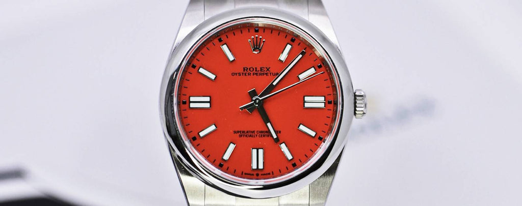 A photo of a Rolex Oyster Perpetual watch, showcasing its classic design.