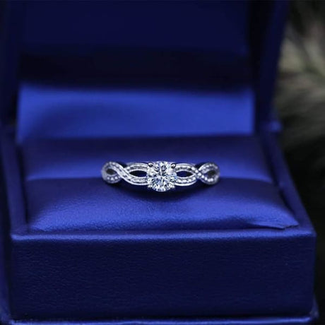 https://www.diamondsourcenyc.com/products/beautiful-18k-white-gold-engagement-ring-with-0-50ct-diamonds