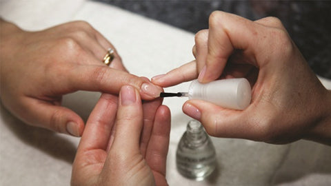 Paint a base coat on the nail tips