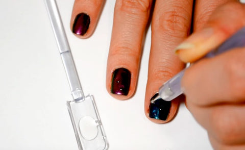 Glue the drops on the nail tips