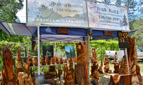 Art booth by Artist Jess Alice’s, Chainsaw carvings and artwork at Art shows, Craft Fairs, events, pop-up-shops to sell and showcase her art. finding forever home for one-of-a-kind hand-crafted wood sculptures made from California Cedar, Redwood, Oak and Pine. Character Production carved animal and nature themed home, business, garden and yard decor. Rustic, cabin aesthetic feel.  2023 2024 2025 Art Faires, Art&Craft Fairs, Home&Garden Shows California things to do, events and fun activities to do with the family, help support local and small business owners and artists. Lewiston California Peddler Faire Art and Craft Fair Trinity County CA