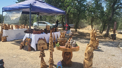 Art booth by Artist Jess Alice’s, Chainsaw carvings and artwork at Art shows, Craft Fairs, events, pop-up-shops to sell and showcase her art. finding forever home for one-of-a-kind hand-crafted wood sculptures made from California Cedar, Redwood, Oak and Pine. Character Production carved animal and nature themed home, business, garden and yard decor. Rustic, cabin aesthetic feel.  2023 2024 2025 Art Faires, Art&Craft Fairs, Home&Garden Shows California things to do, events and fun activities to do with the family, help support local and small business owners and artists.