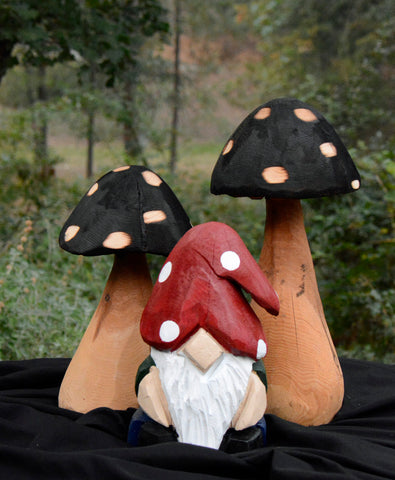 Double Mushroom abd Garden Gnome Chainsaw Carved Wood sculptures, one-of-a-kind handmade from a single mother in northern california. Chainsaw Artist Jess Alice creates a fairy garden theme home decor for a whimsical and forest feeling accent to any space