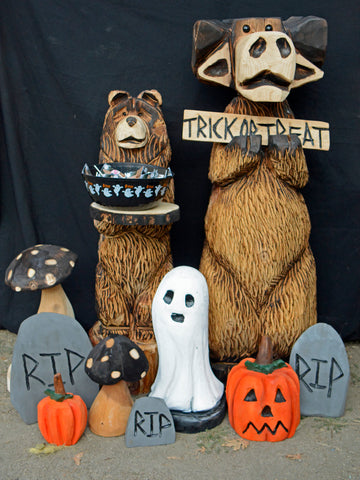 Halloween Decorations, indoor and outdoor Fall decor for home, and business. Chainsaw Carved from California Cedar. 4ft moose wood sculpture, 3ft Side table bear holding candy trick-or-treat bowl for halloween night. surrounded with ghosts, pumpkins and mushrooms and tombstones makes this a festive scene that livens up any space.