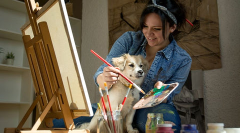 Mindfulness and the importance of Art, Creative expression promotes mental and physical health and wellbeing. woman sitting facing her easle painting