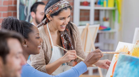 Art class with a group of people practicing and enjoying being creative