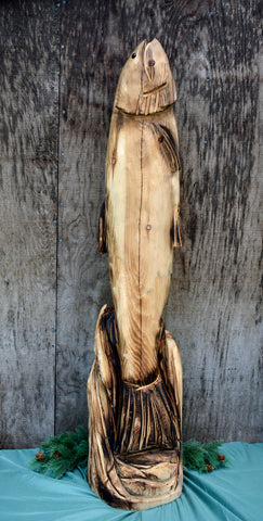 Chainsaw carved wood sculptures Artist Jess Alice Raw California cedar Handcrafted artwork Unique wooden sculptures Rustic chainsaw carvings Nature-inspired art One-of-a-kind creations Natural beauty of cedar wood Artistic craftsmanship SEO Description: Discover the exquisite world of chainsaw carved wood sculptures by renowned artist Jess Alice. Each piece is meticulously crafted from raw California cedar, showcasing the natural beauty and authenticity of the wood. With a passion for nature-inspired art, Jess Alice creates unique and one-of-a-kind sculptures that capture the essence of the subject. From majestic wildlife to intricate designs, these rustic chainsaw carvings are a true testament to the artist's exceptional talent and artistic craftsmanship. Explore this captivating collection of handcrafted artwork and bring the beauty of raw California cedar into your home or collection. jumping 3ft fish sculpture. wood carved fish art