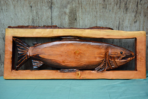 Wall mount framed fish. Chainsaw carved wood sculptures Artist Jess Alice Raw pine wood Handcrafted artwork Unique wooden sculptures Rustic chainsaw carvings Nature-inspired art One-of-a-kind creations Natural beauty of pine wood Artistic craftsmanship SEO Description: Immerse yourself in the world of chainsaw carved wood sculptures by acclaimed artist Jess Alice. Each piece is meticulously handcrafted from raw pine wood, showcasing the natural beauty and charm of this versatile material. With a deep appreciation for nature and a keen eye for detail, Jess Alice creates extraordinary and one-of-a-kind sculptures that capture the essence of the subject. From majestic wildlife to intricate designs, these rustic chainsaw carvings are a true testament to the artist's exceptional talent and artistic craftsmanship. Explore this captivating collection of handcrafted artwork and bring the timeless allure of raw pine wood into your home or art collection.