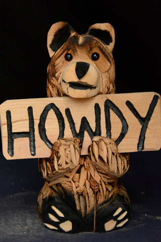 16" Chainsaw carved sign bear "Howdy" Fun rustic home decor, perfect for indoor and outdoor accents, perfect for your vacation cabin, home away from home decor, gift ideas for anyone, creative and one-of-a-kind unique and fun gifts for holiday ideas, birthday presents for home, garden and business. Rustic Wood sculptures, Jess Alice Chainsaw artist,