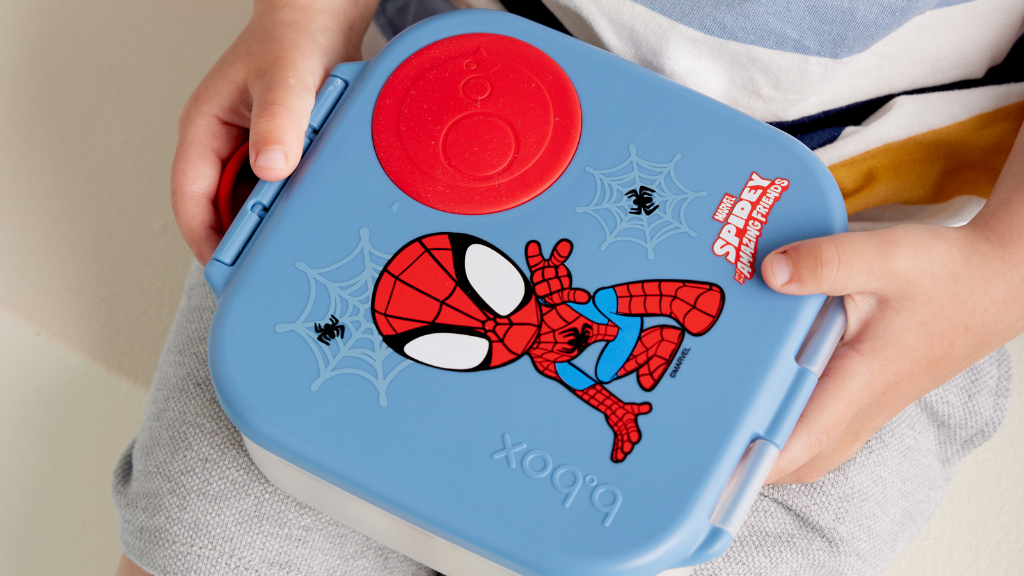 preschooler with b.box mini lunchbox spidey range