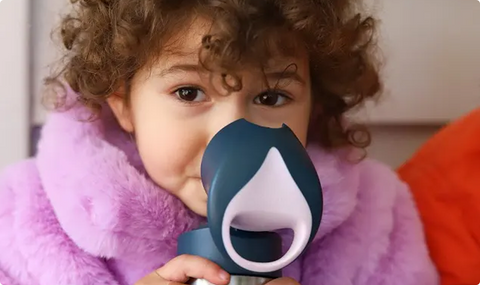 kid drinking from insulated drink bottle