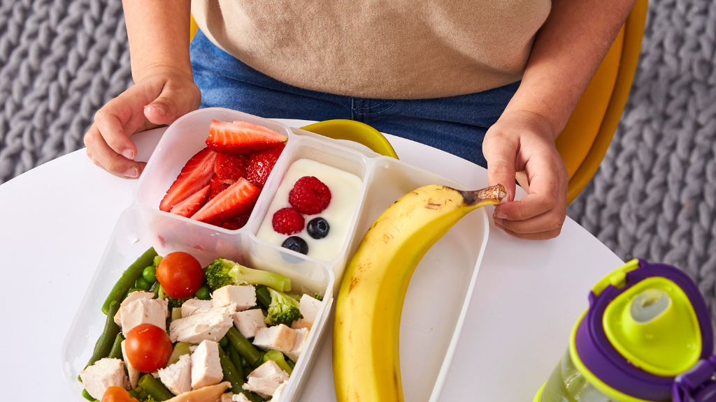 Healthy lunch of salad and fruit in b.box lunchbox