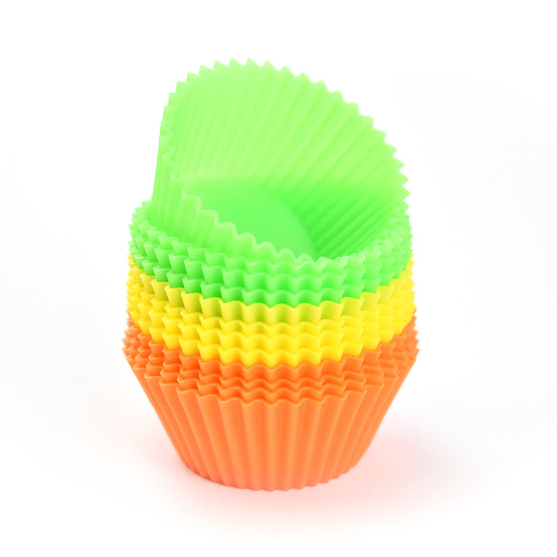 https://cdn.shopify.com/s/files/1/0523/9145/files/silicone-baking-cupcake-liners-for-bento-boxes-orange-yellow-green-open-12-pack-bento-accessories-cute-kid-stuff-cute-kid-stuff-0_1600x.jpg?v=1682553707