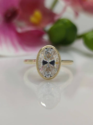 rachel oval moissanite bezel engagement ring