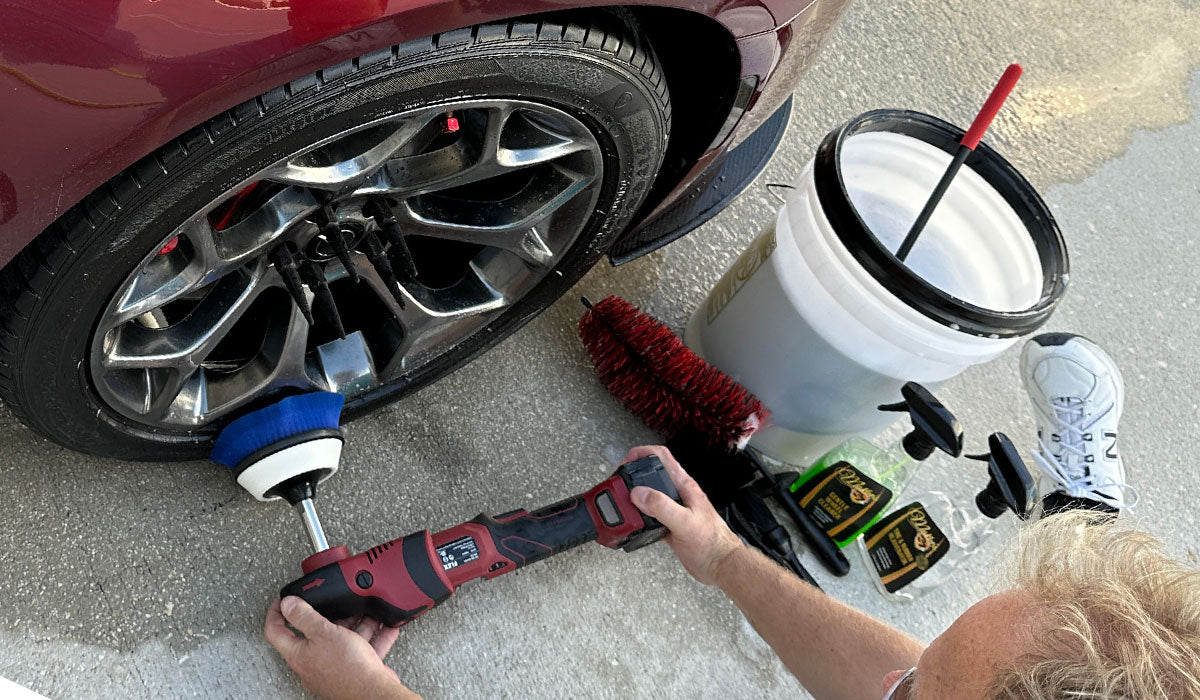 Machine scrubbing tires with FLEX cordless PE-150 Cordless Rotary Polisher