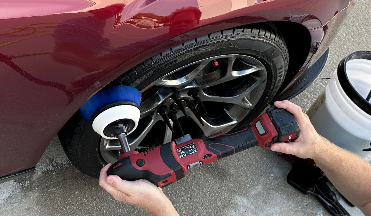 Machine scrubbing tires with FLEX cordless PE-150 Cordless Rotary Polisher