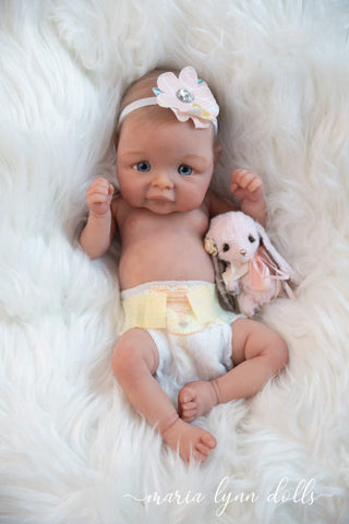 Zoe with a toy lamb