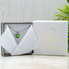 Swarovski Peridot Magnetic Necklace elegantly presented in a luxury eco-friendly gift box.