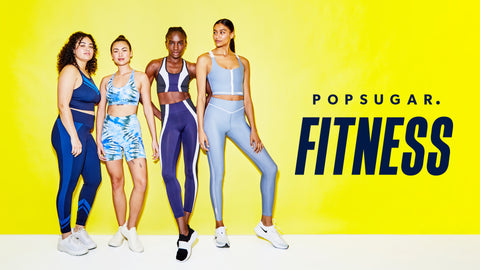 5 Fitness YouTube Channels with Amazing At-Home Workouts: Four women in activewear stand against a yellow background.