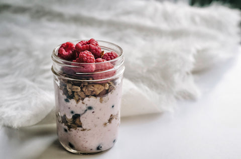 These Breakfast Recipes Will Set You Up for a Healthy Day: A jar of overnight oats sits on a white countertop.