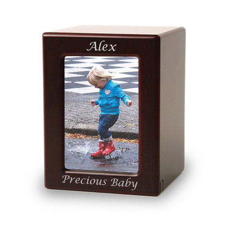 Designed with care, this cherry MDF child cremation photo urn offers a loving tribute to the innocence and joy of childhood.