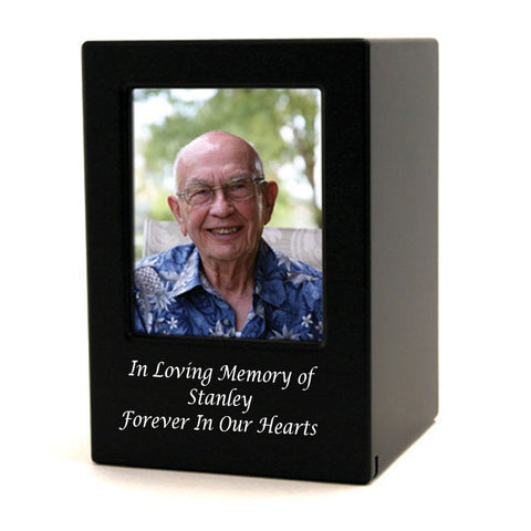 Elegant and timeless, this black cremation photo urn provides a dignified resting place for your loved one's ashes.