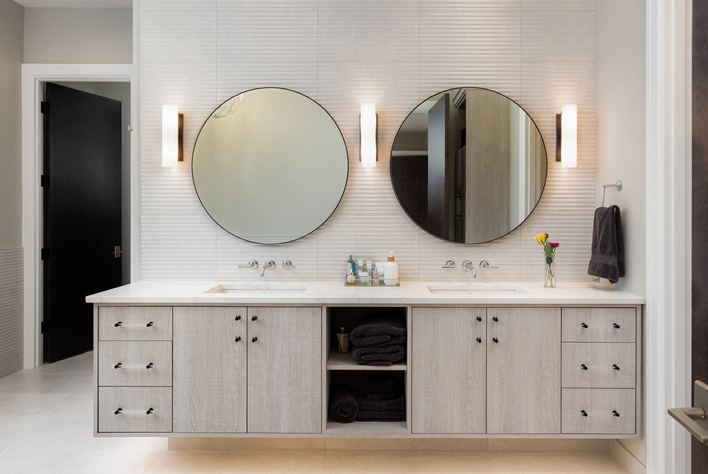 vanity with two mirror and three light sconces