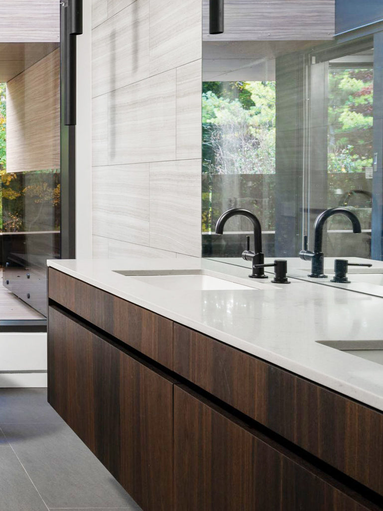 bathroom with custom vanity and quartz countertop bathroom