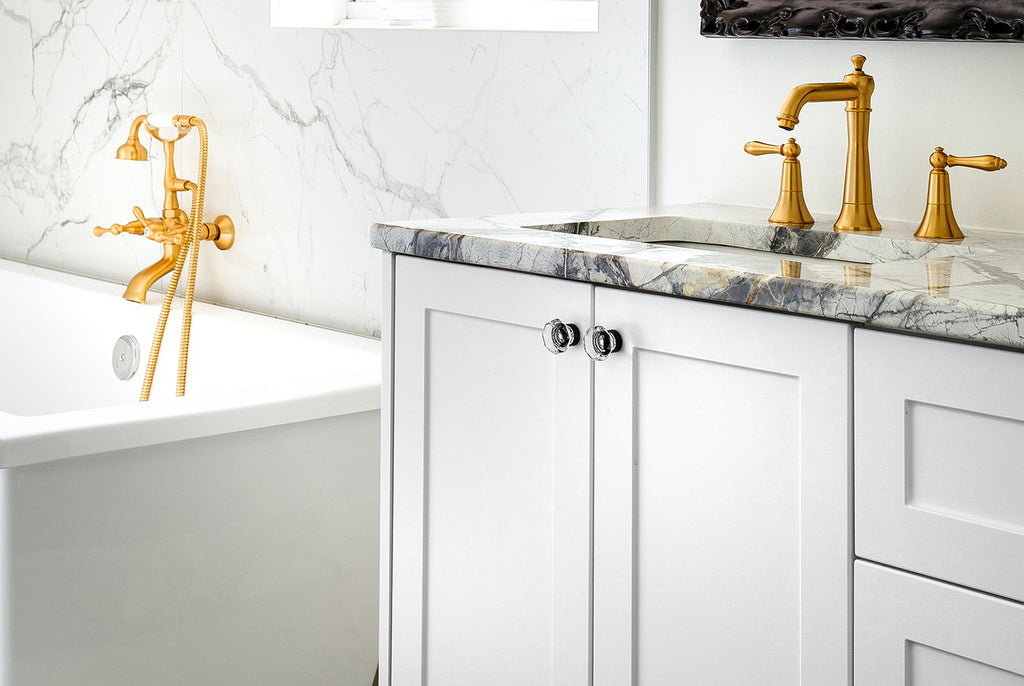 white transitional bathroom vanity with marble countertop