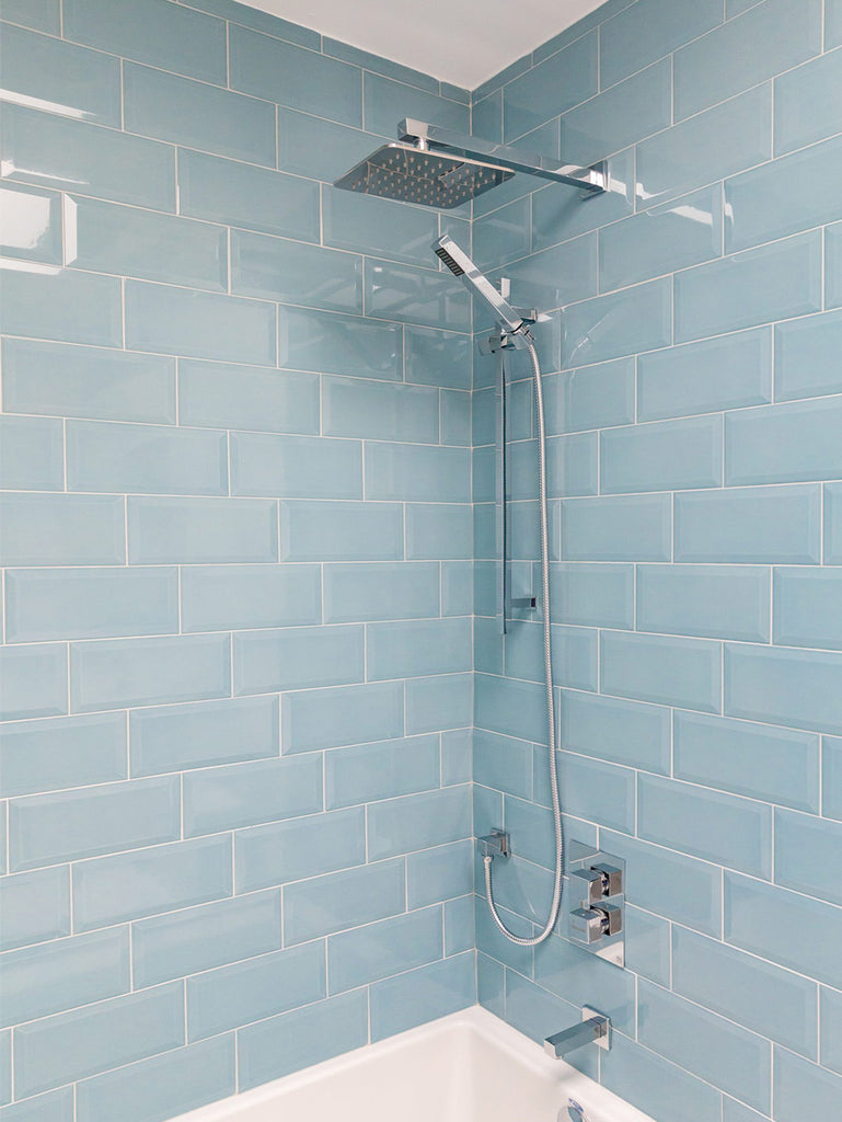 veneto bath shower fixtures with blue tile 