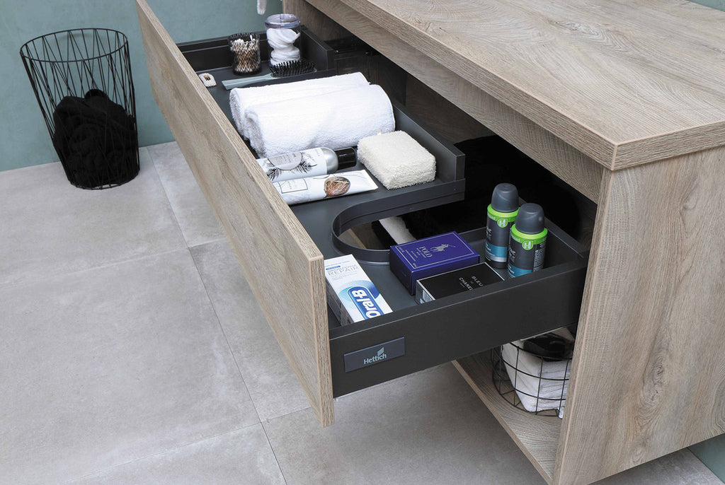 wood veneer bathroom with cabinet open to reveal bathroom accessories