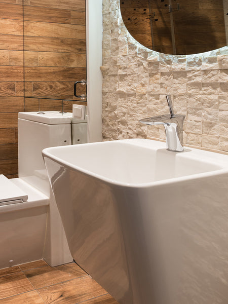 chrome single handle faucet in a modern bathroom