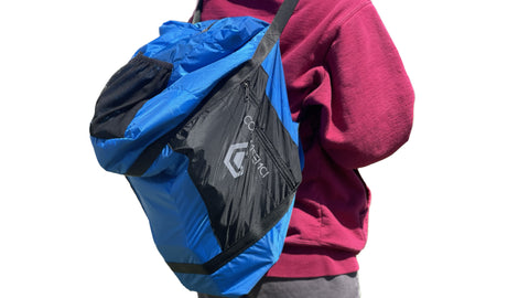 Multipocket weekend duffle bag made from recycled sleeping bag fabric by Contingenci
