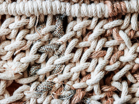 Brown rope on white surface