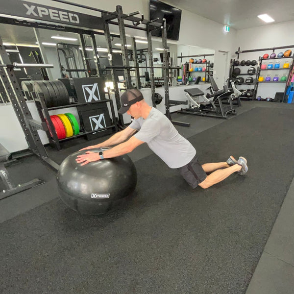 a great core exercise is the wheelbarrow on an xpeed gym ball