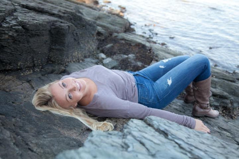 Model Madelyn Brackett wears Mother Denim and Frye boots at Fort Adams