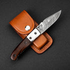 https://cdn.shopify.com/s/files/1/0524/4531/5257/products/FS-1865-J-H-Patterson-Damascus-Steel-Pocket-Knife-01_140x140.jpg?v=1686669509