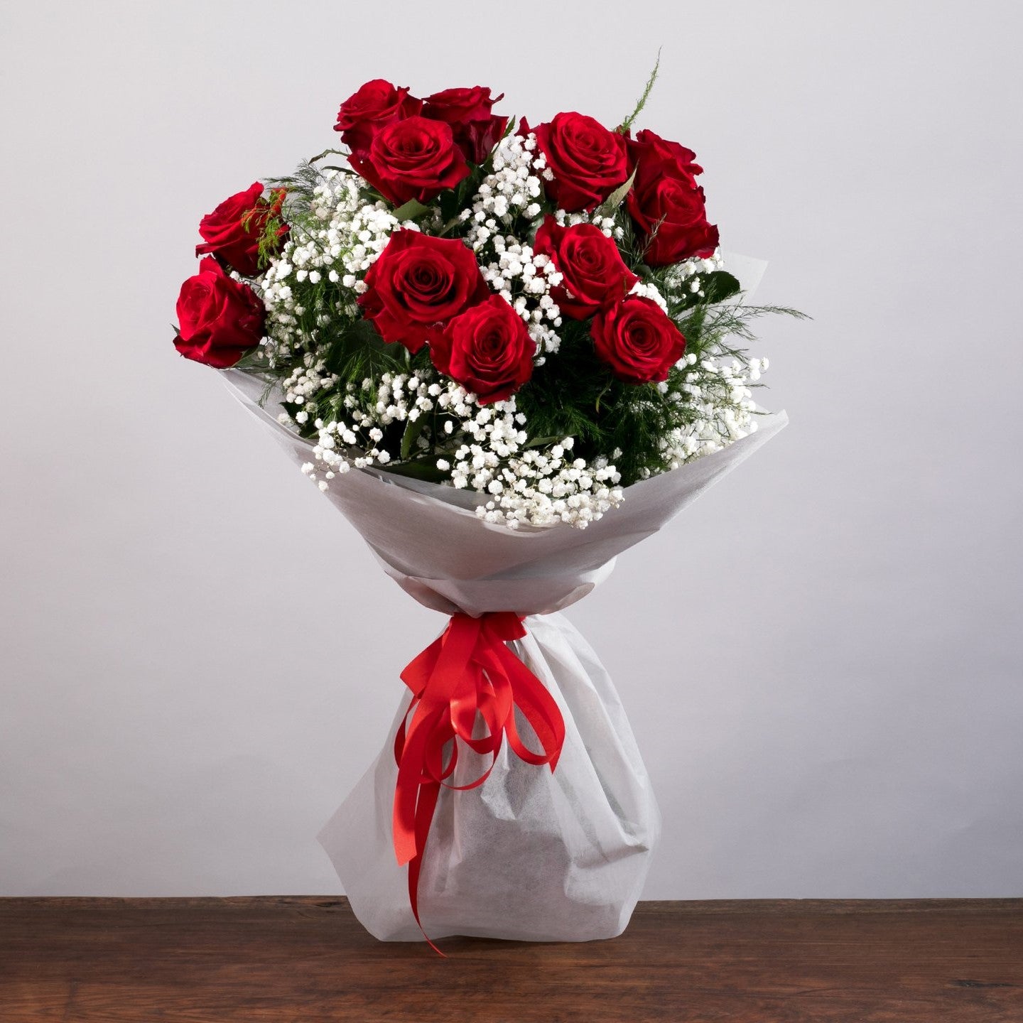 bouquet of red roses in vase