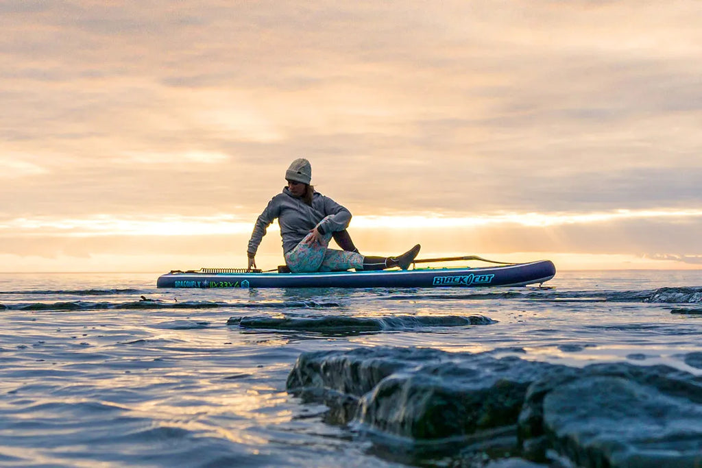 Why Stand Up Paddle Board Yoga Is The Best Summer Workout - Camille Styles