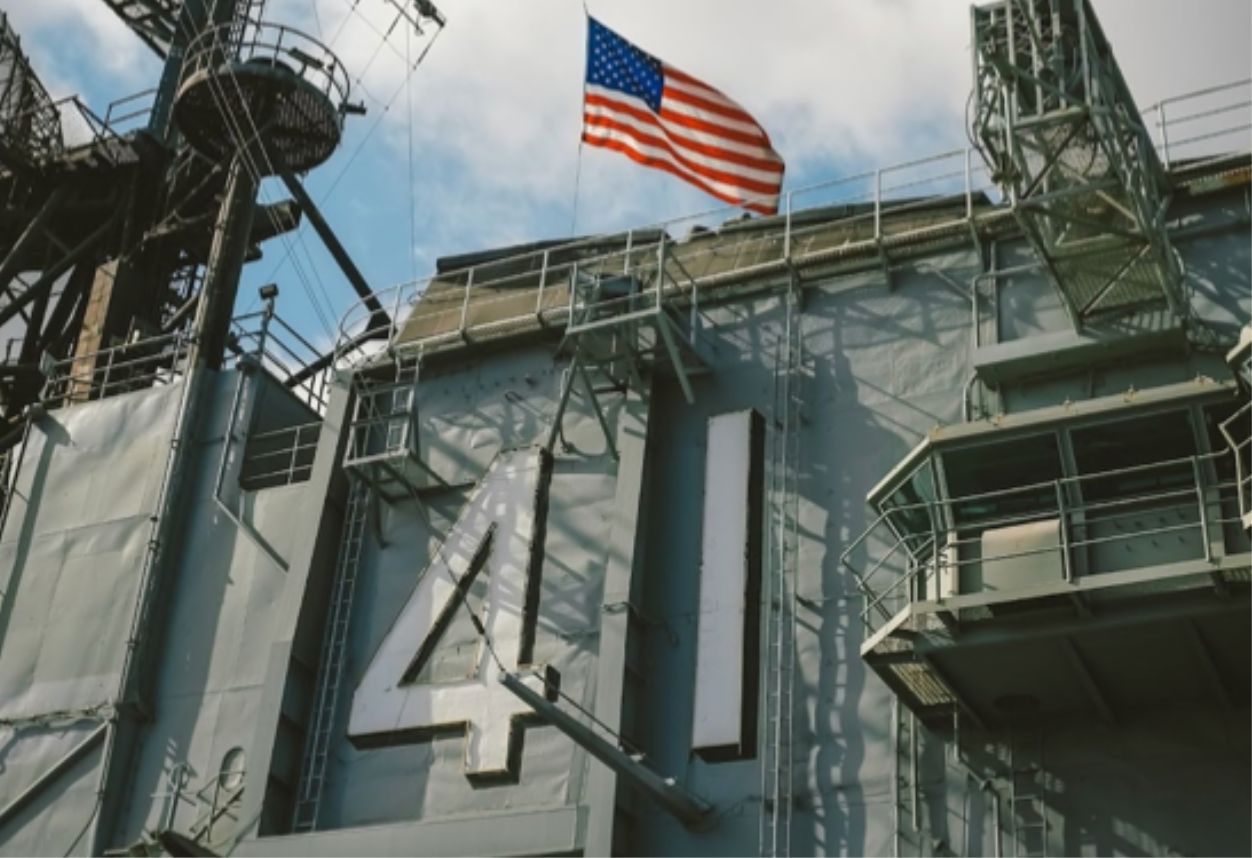 Large 41 and flag on the side of a large part of the Aircraft Carrier Museum