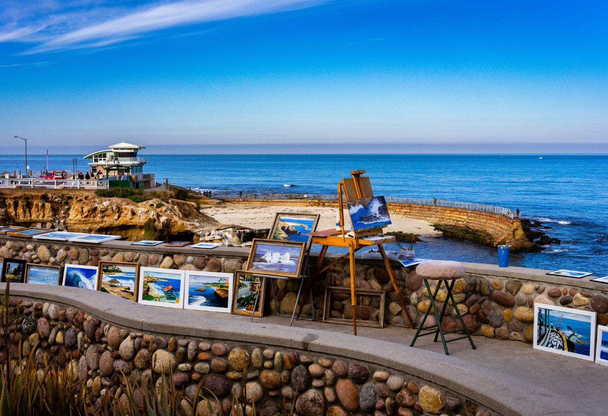 Photos of art and culture of La Jolla village in from of children pool La Jolla