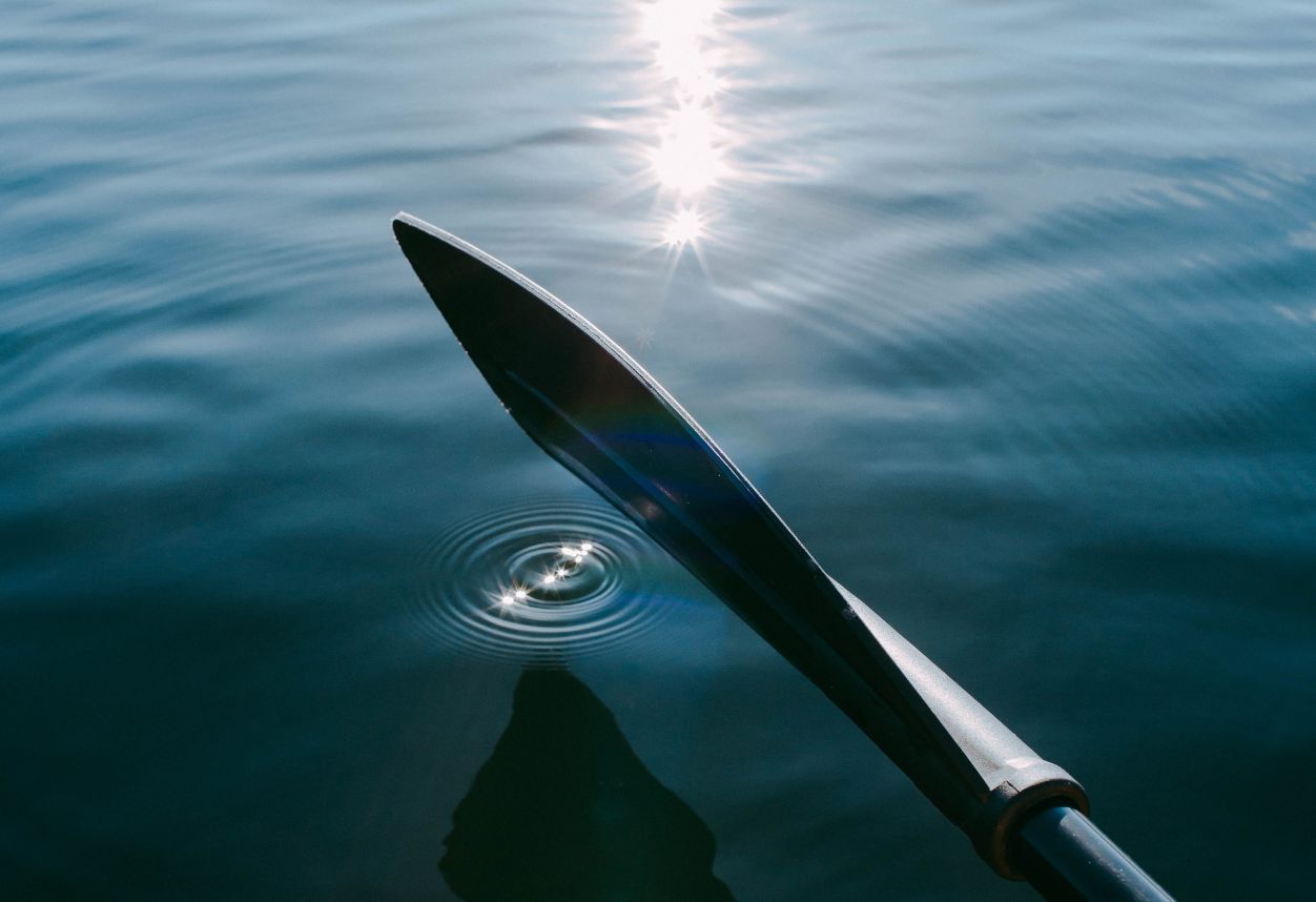 a paddle for an inflatable paddle board above water in San Diego California