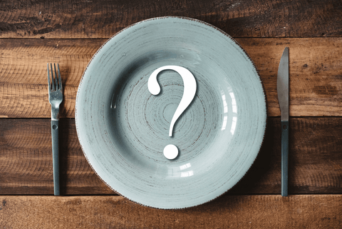 Dinner plate with a question mark over top of it