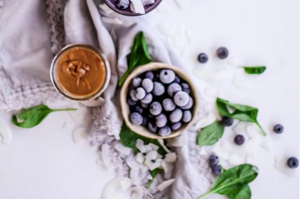 Blue berries and almond butter and spinach