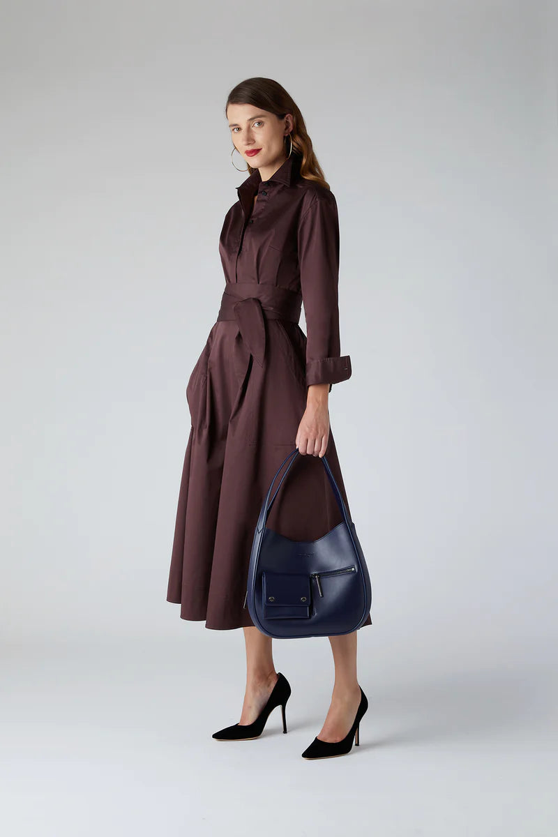 Brown Blythe full skirt shirt dress is paired with our Dahlia hobo bag in navy blue