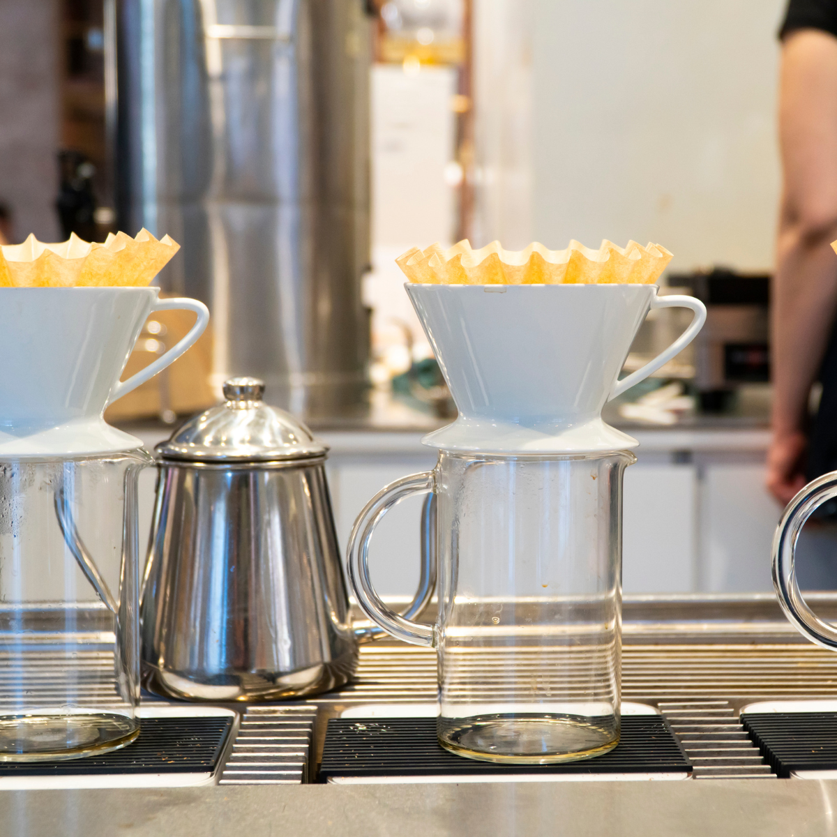 Pour-over brewing station in a coffee shop.