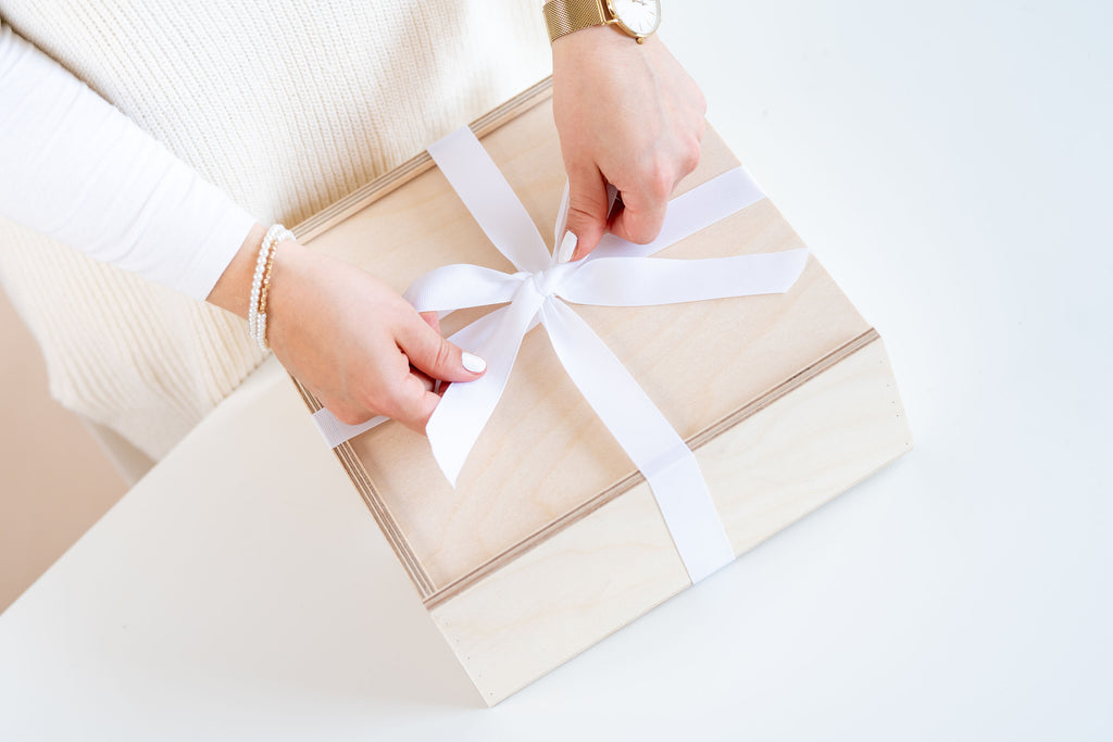 wooden keepsake gift box with white ribbon