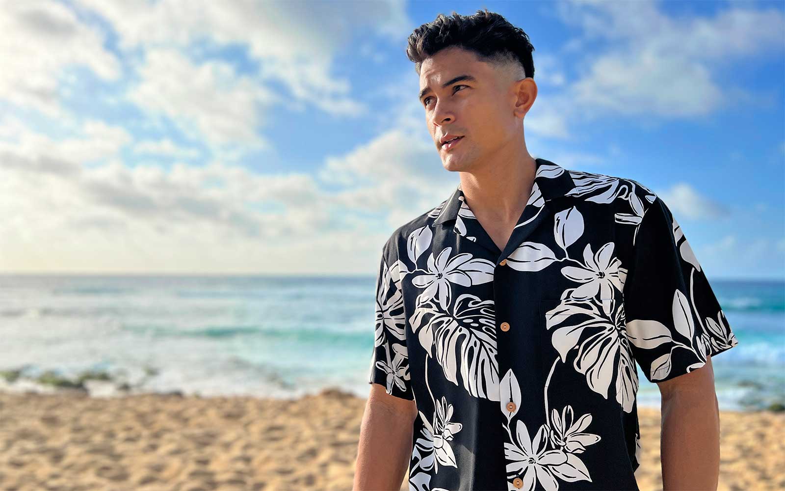 Man at Beach in Tiare Black Hawaiian Shirt