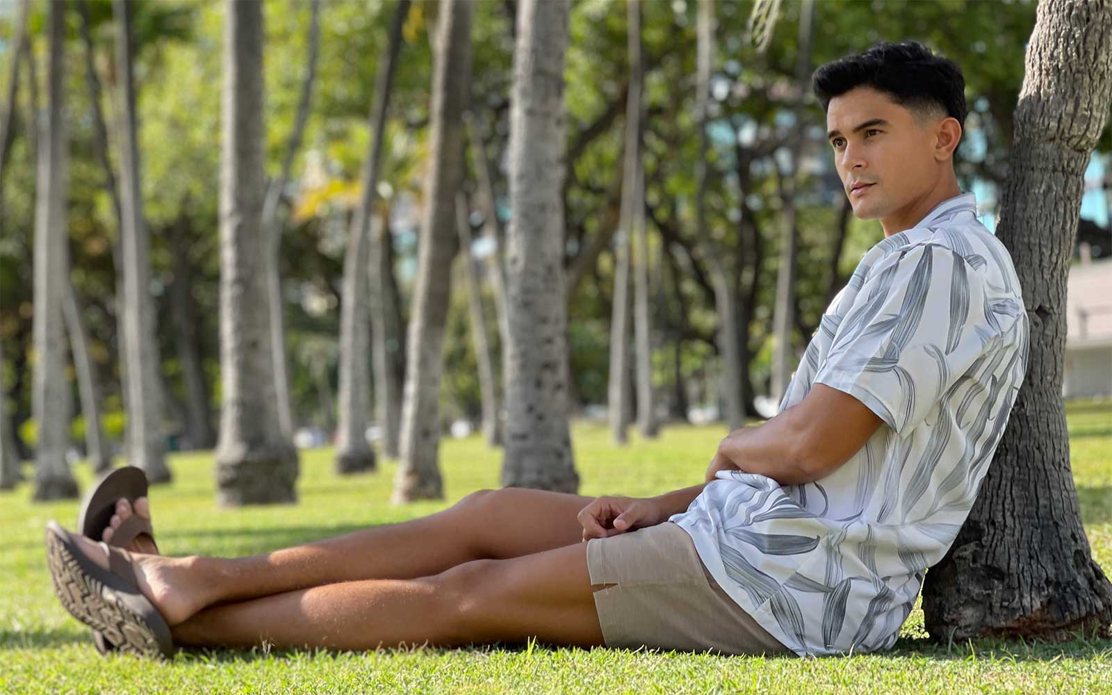 Sitting Next to Palm Tree in Aloha Shirt